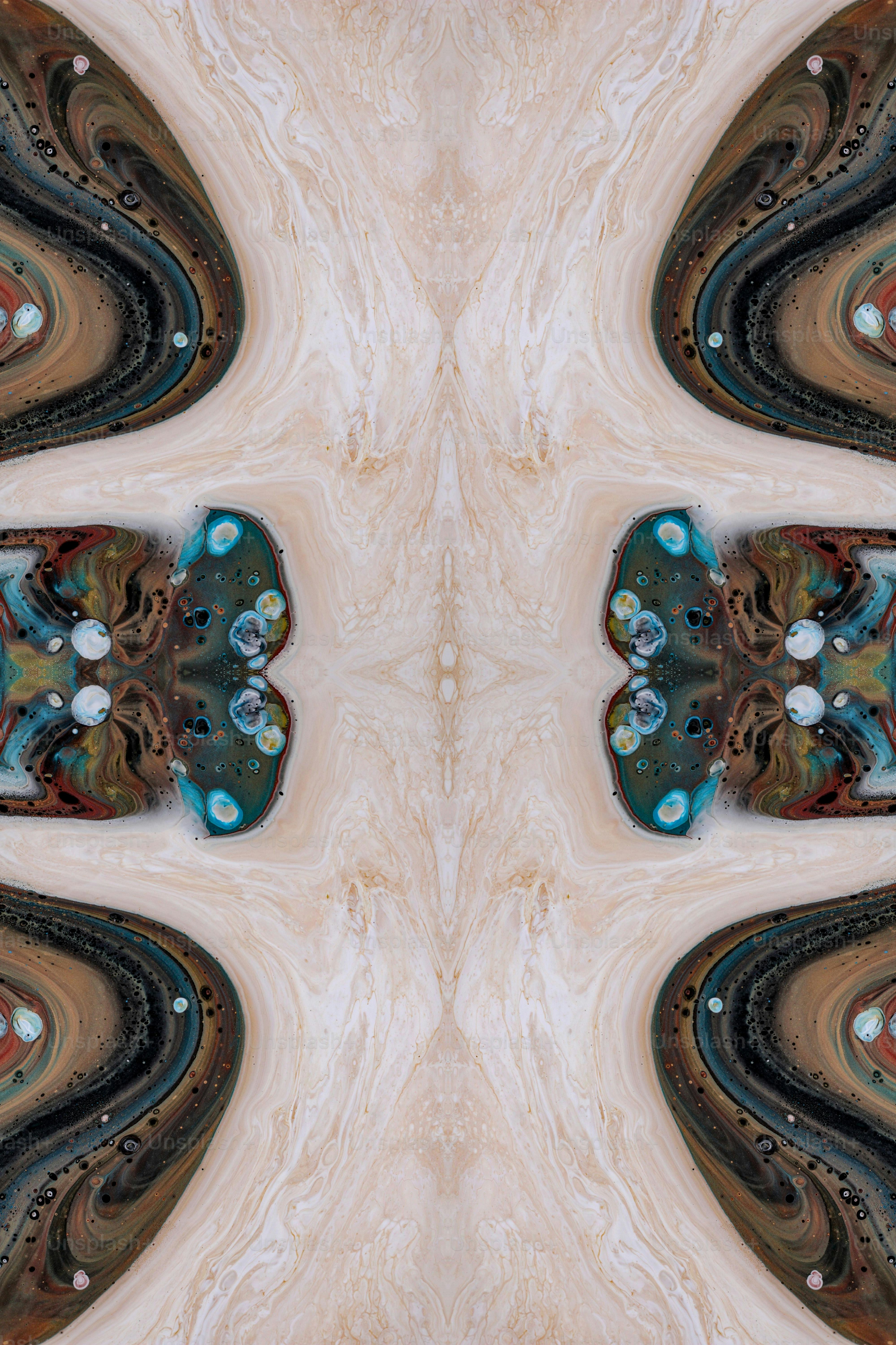 Una imagen abstracta de un patrón compuesto de diferentes colores y formas
