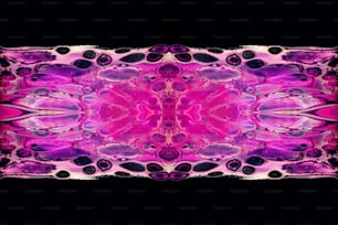 ein rosa und violettes Muster auf schwarzem Hintergrund