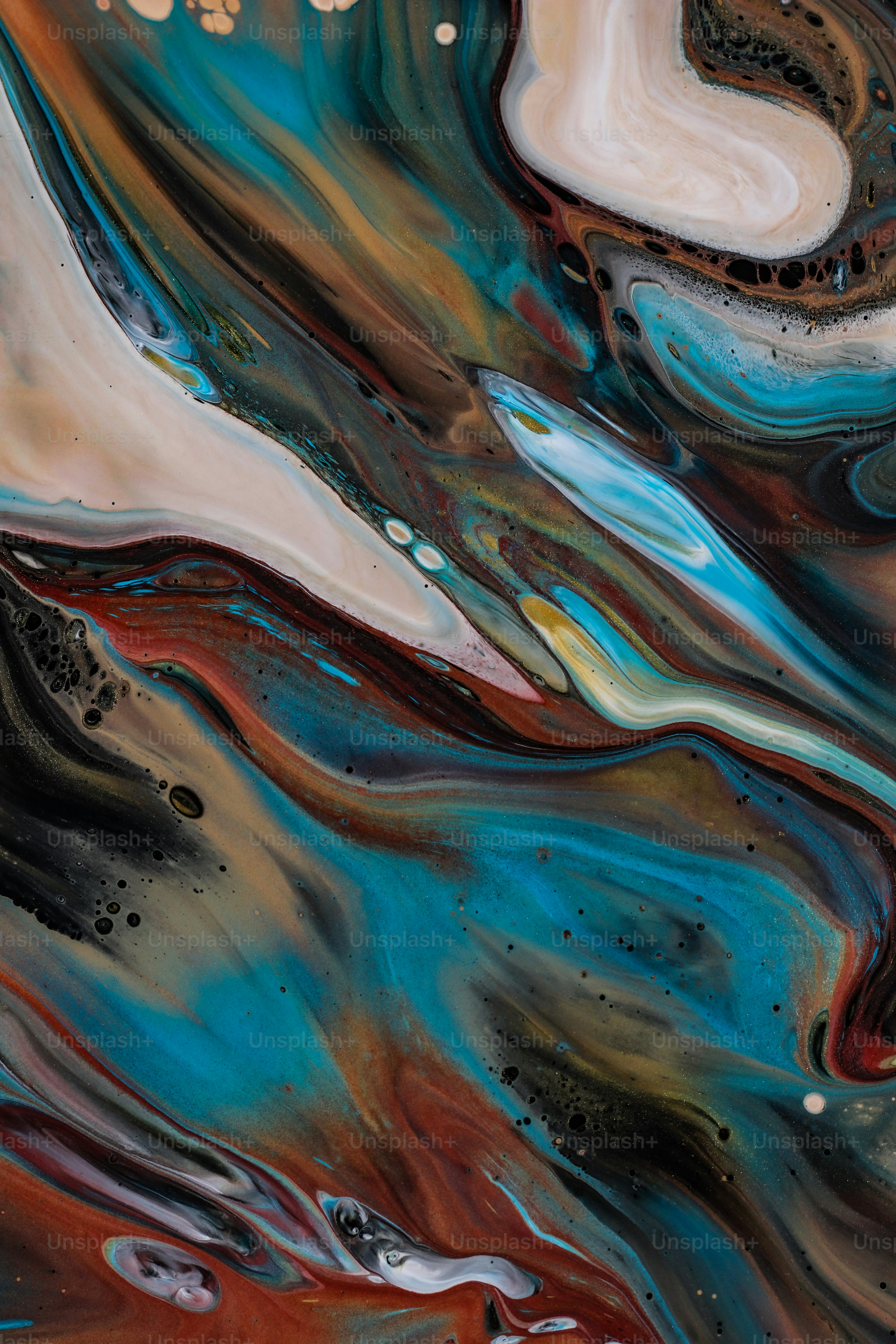 a close up of a painting with different colors