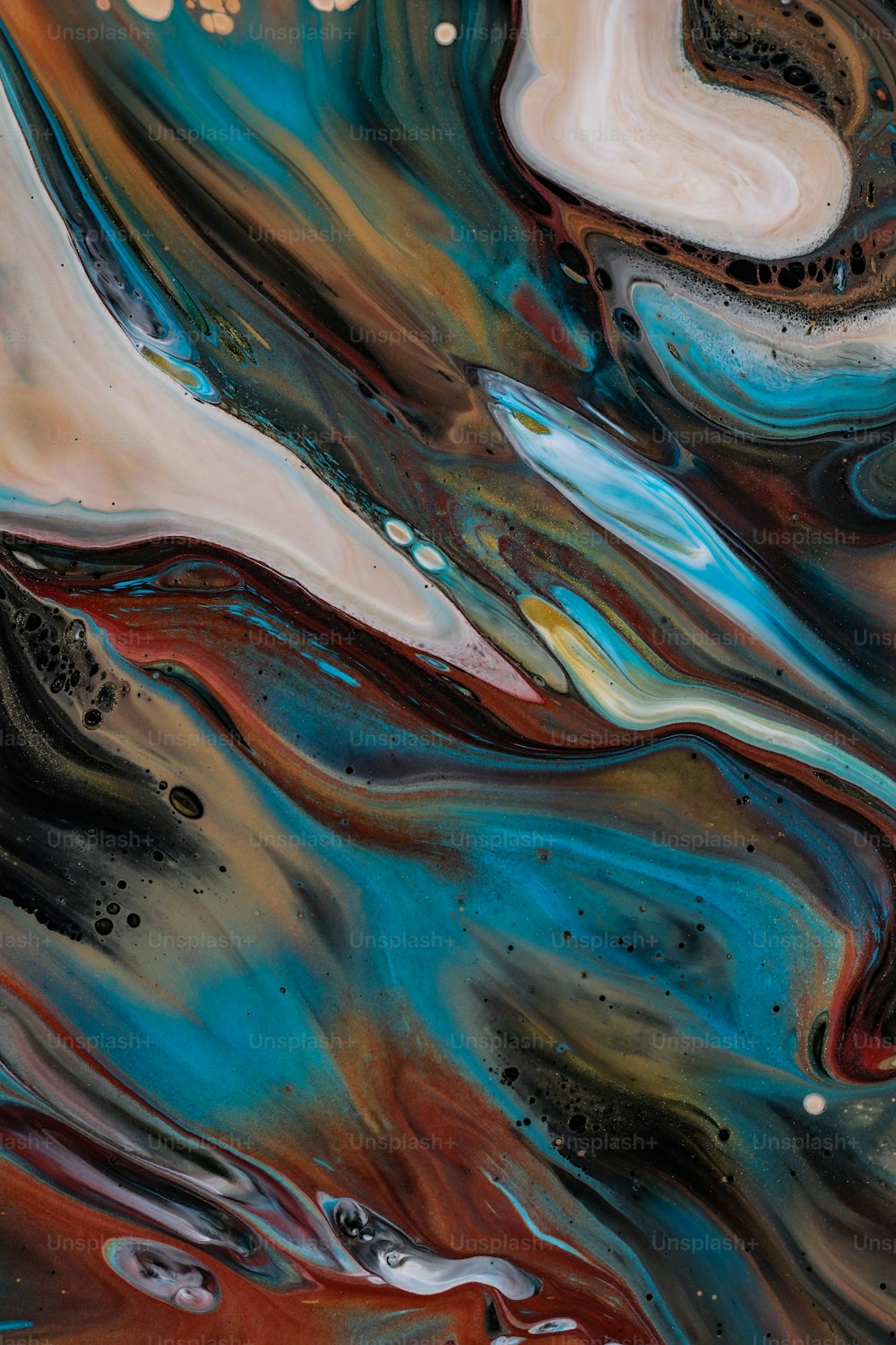 a close up of a painting with different colors