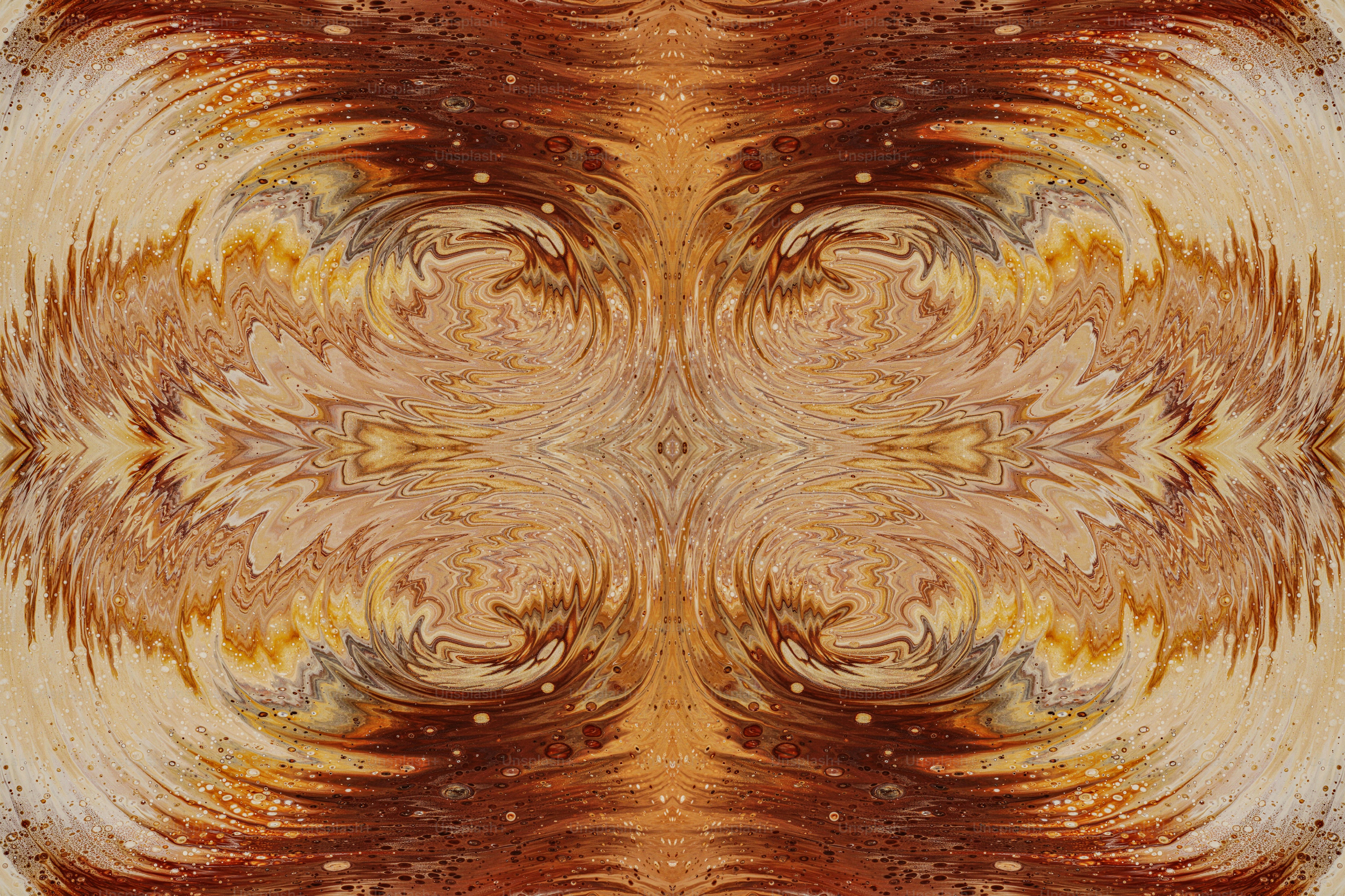 a picture of an abstract design in brown and yellow