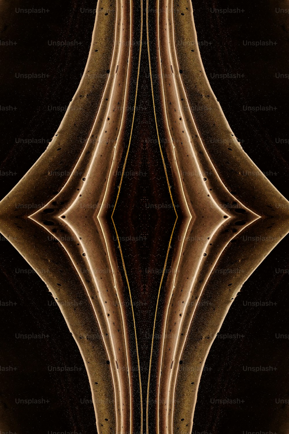 an abstract photograph of a brown and black pattern