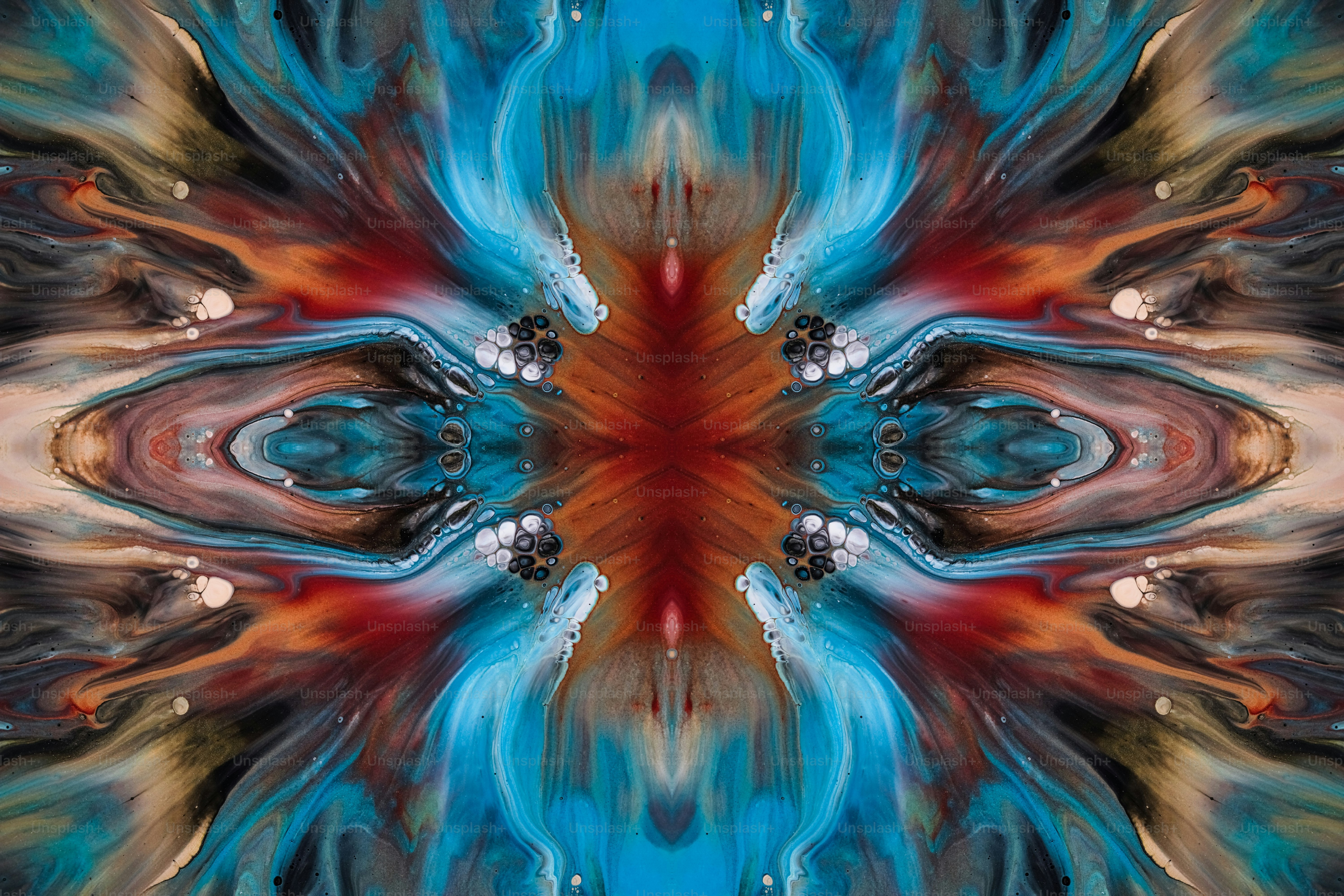 Una imagen abstracta de una flor azul y naranja