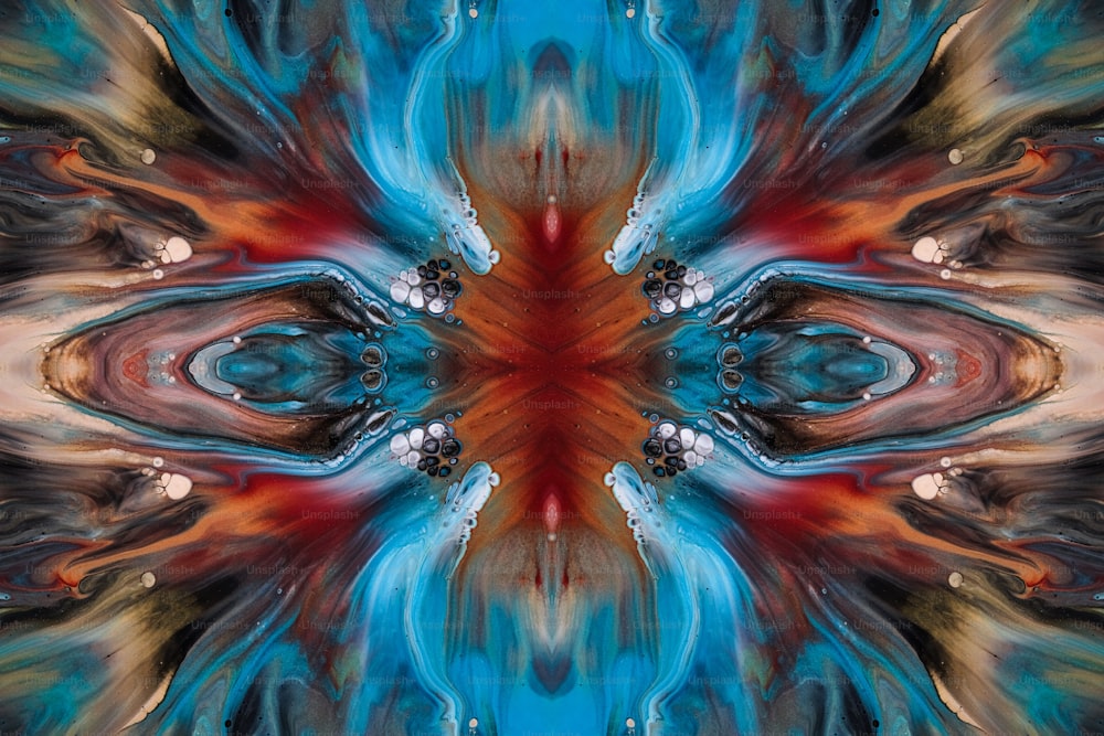 an abstract image of a blue and orange flower