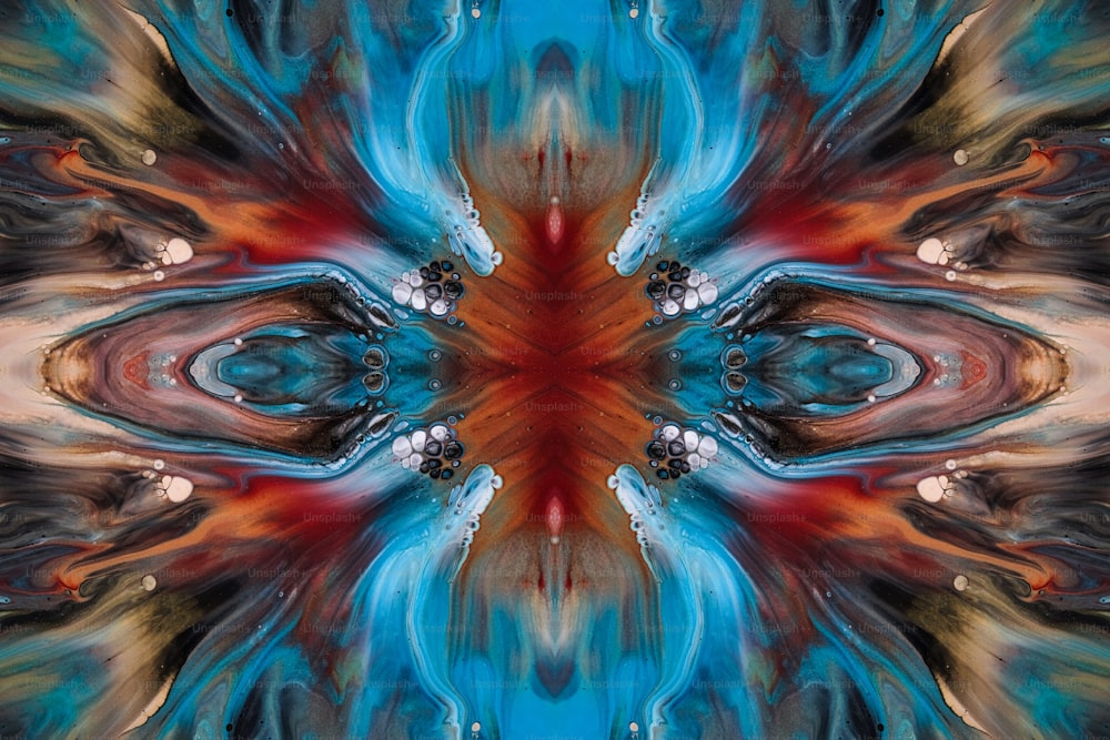 Une image abstraite d’une fleur bleue et orange