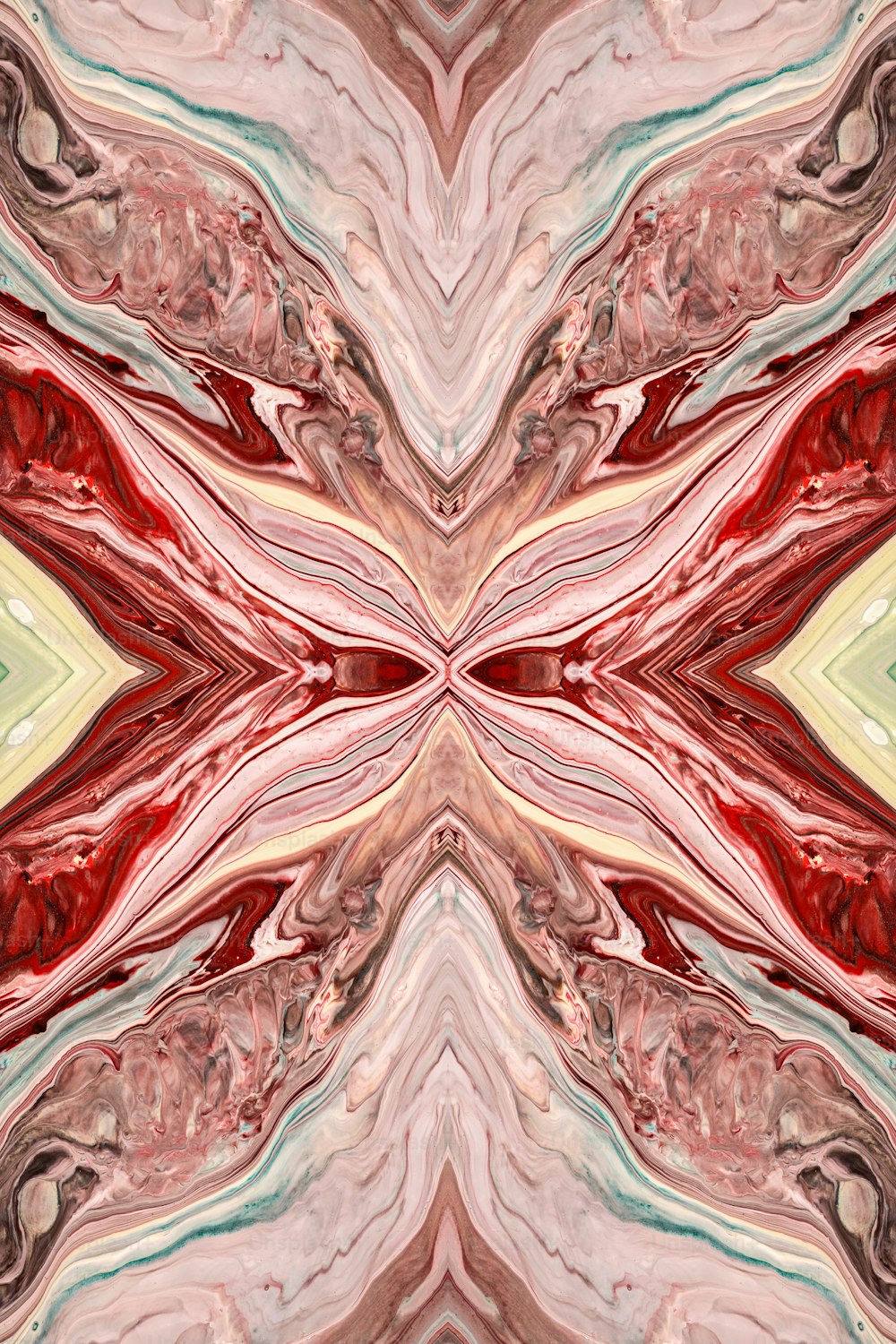 an abstract image of red, pink, and green shapes