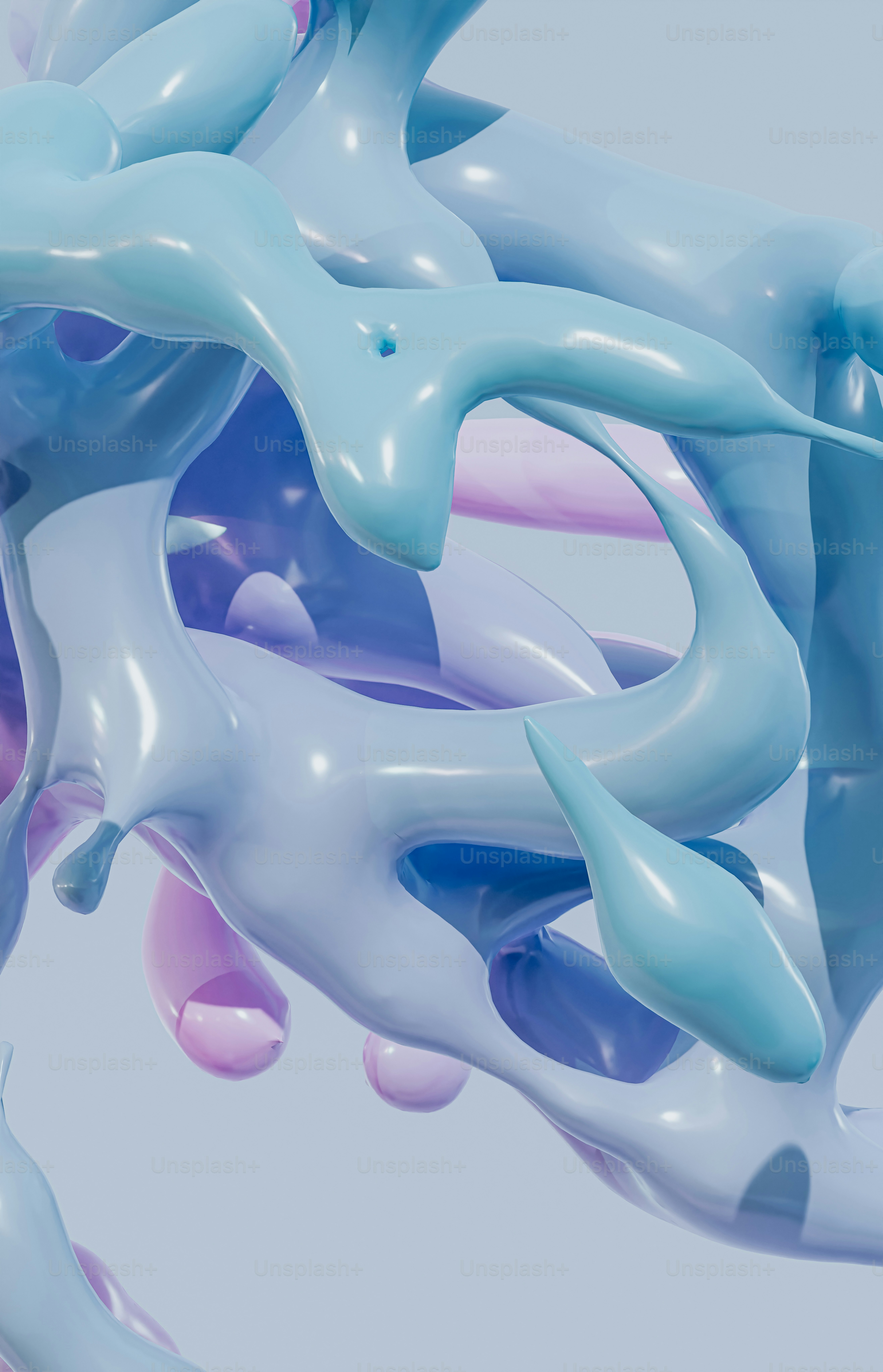 a bunch of blue and pink balloons floating in the air