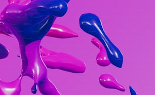 a bunch of purple and blue balloons floating in the air