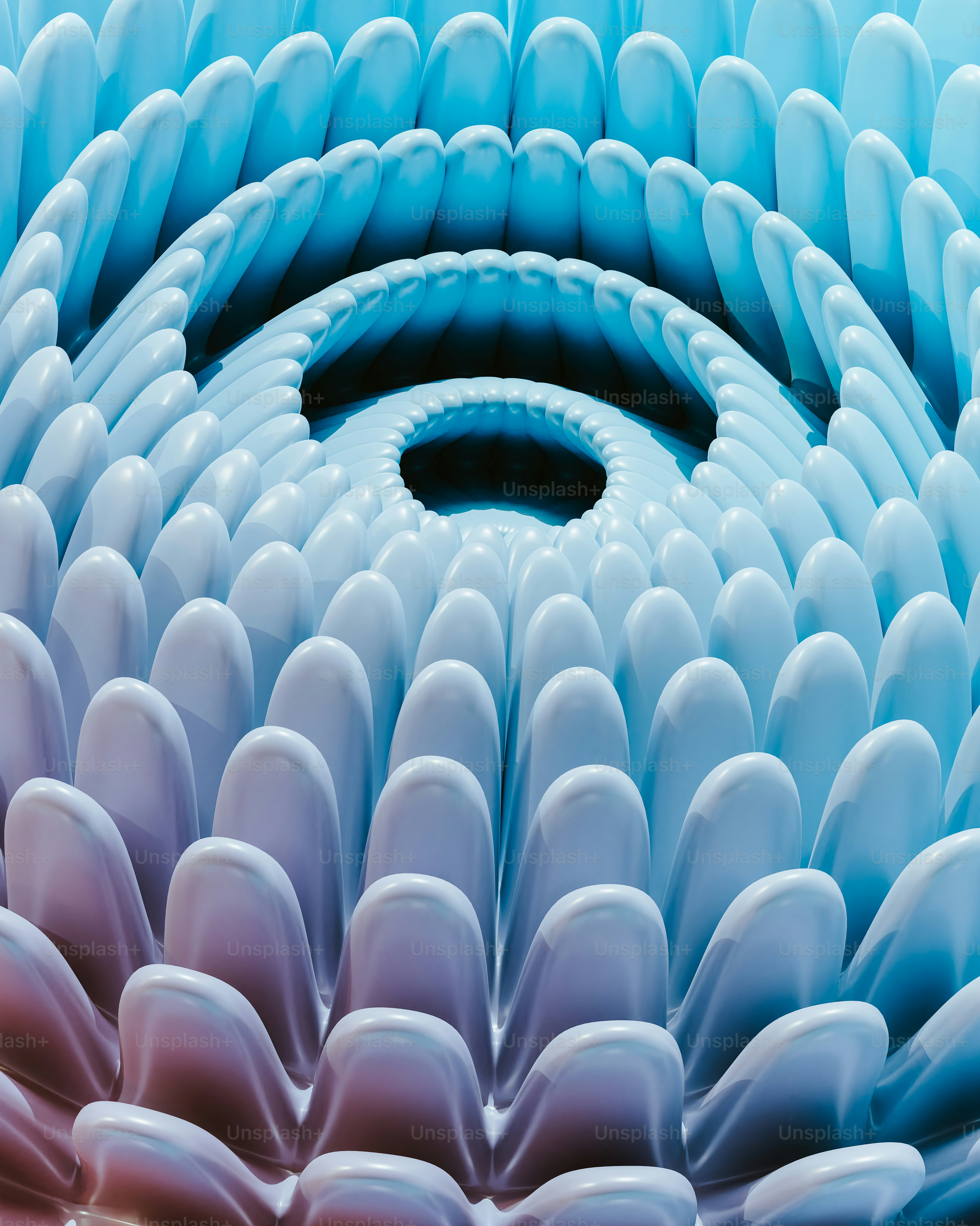 a large blue object with a hole in the middle of it