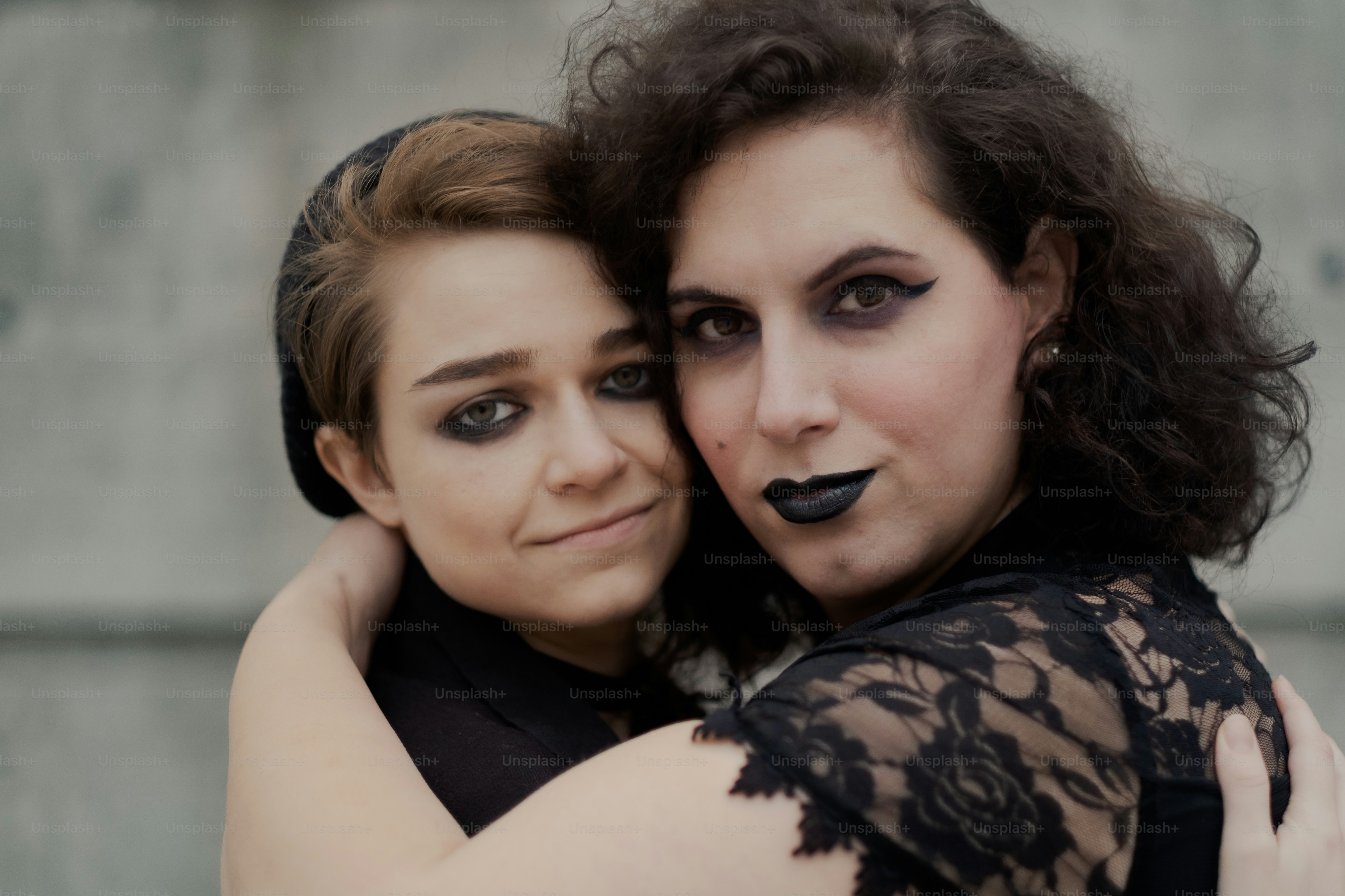 A couple of women standing next to each other photo – Transwoman Image ...