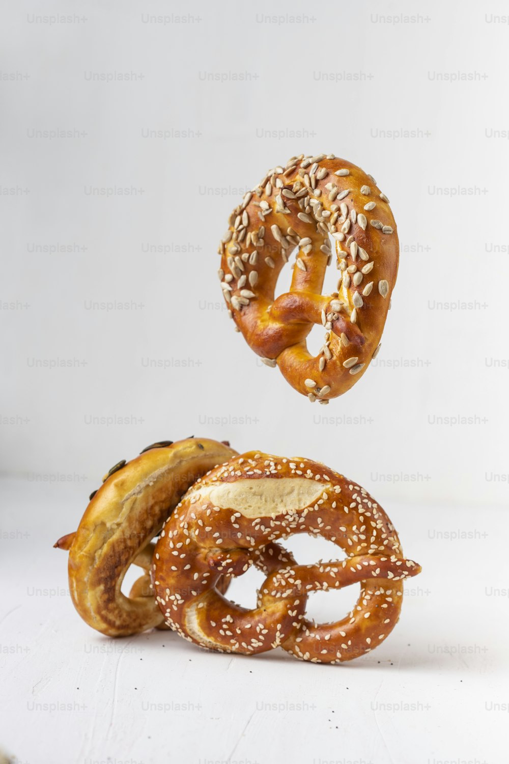 a couple of pretzels flying through the air