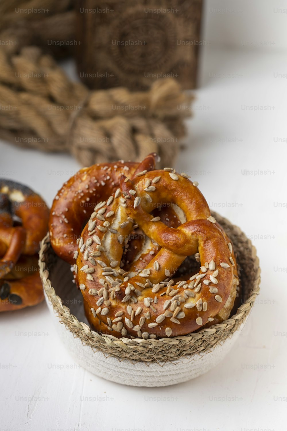 a couple of pretzels sitting in a bowl on a table