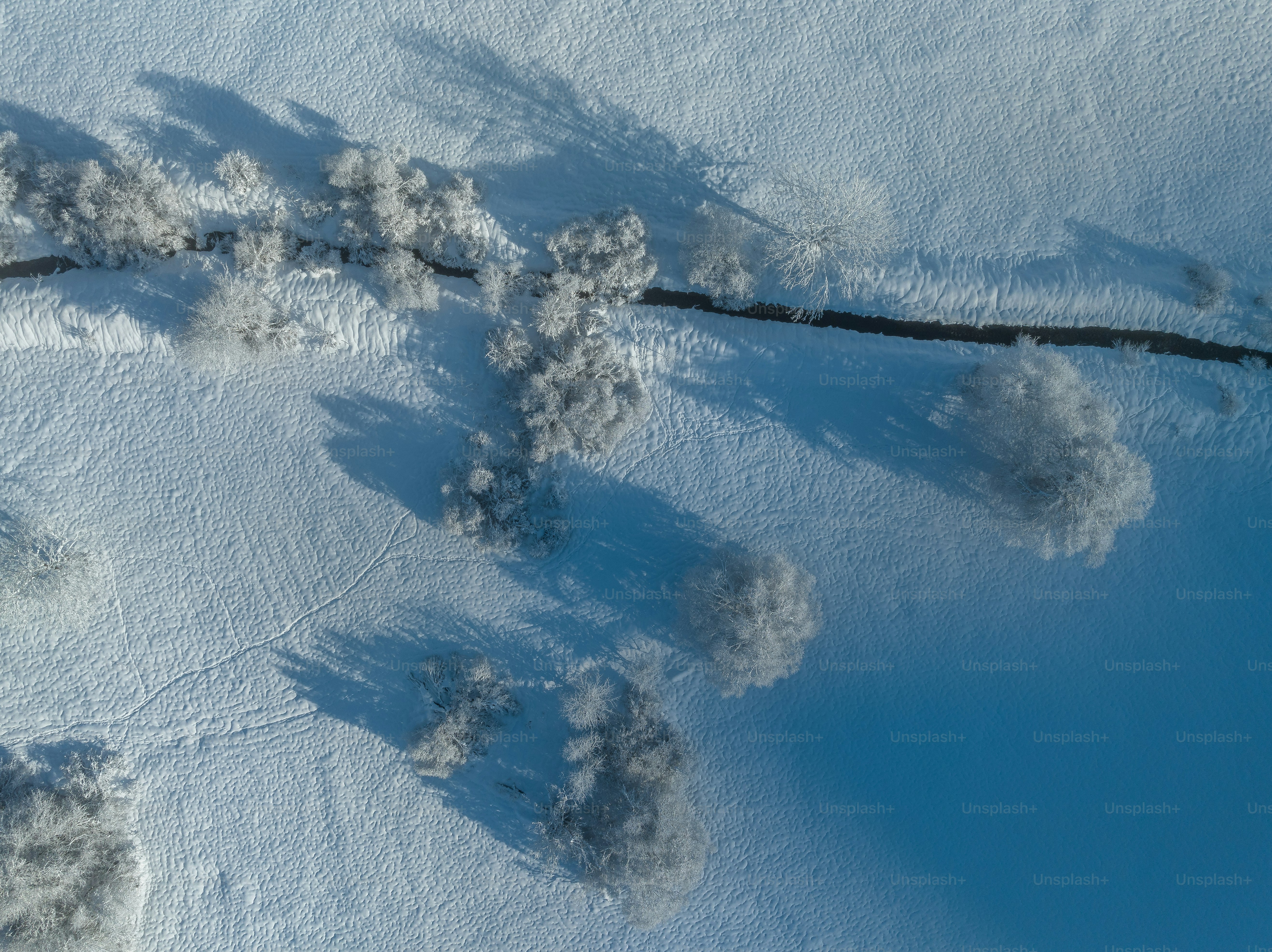 Winter landscape on a snowy morning taken with a drone.