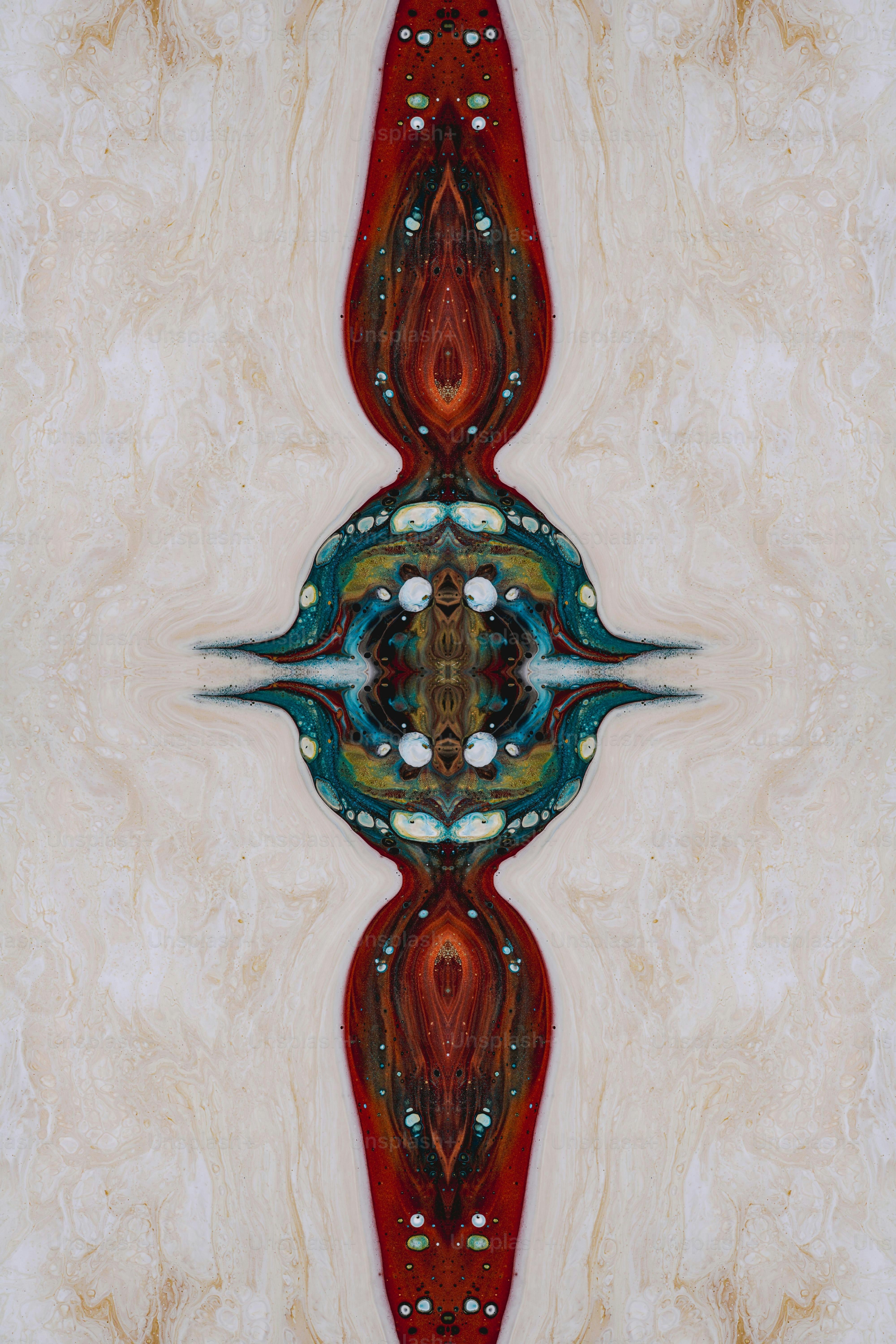 a picture of a red and green design on a white background