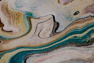 a close up of a marbled surface with different colors