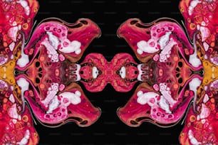 an abstract image of a red and pink flower
