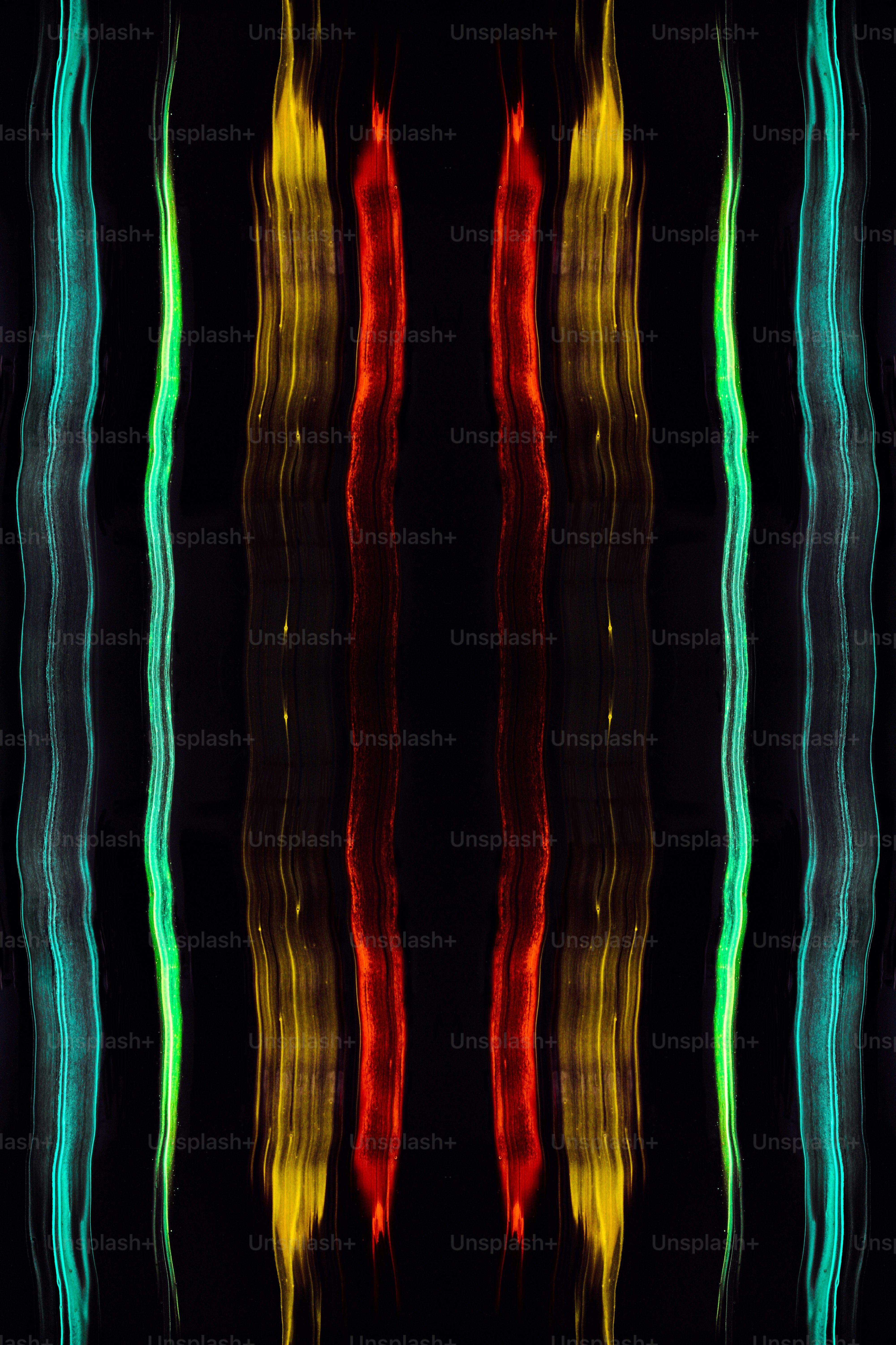 a black background with a multicolored pattern of wavy lines