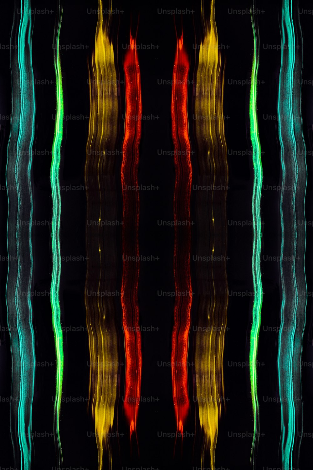 a black background with a multicolored pattern of wavy lines