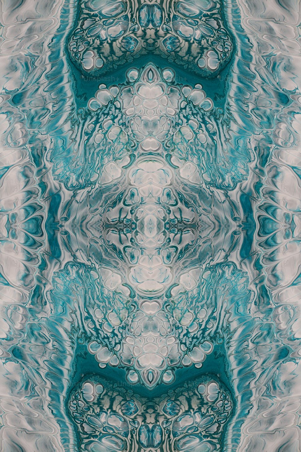 Una imagen abstracta de un patrón azul y blanco