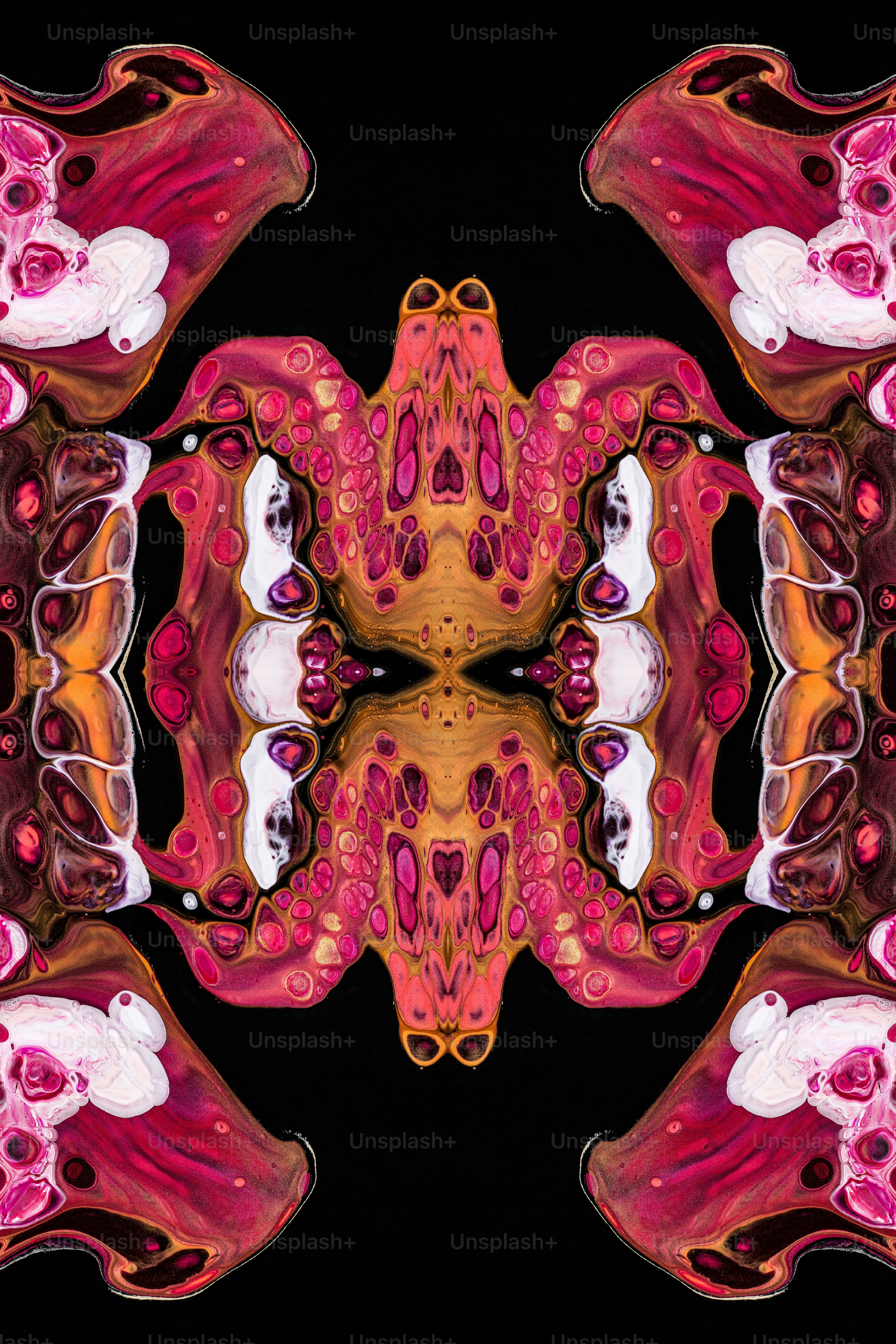 an abstract image of a pink and yellow flower