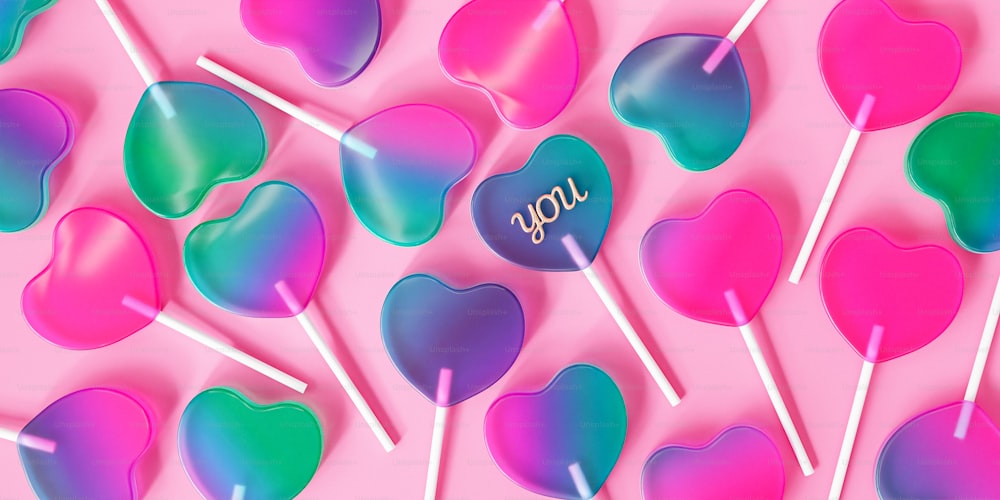 a bunch of lollipops with the word joy on them