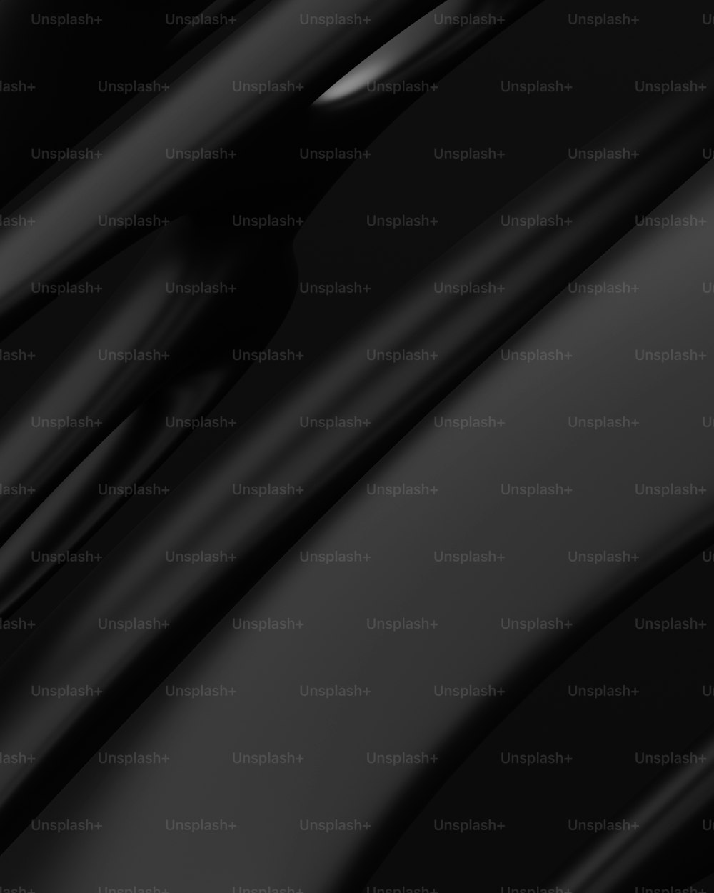 um close up de um fundo preto com linhas onduladas