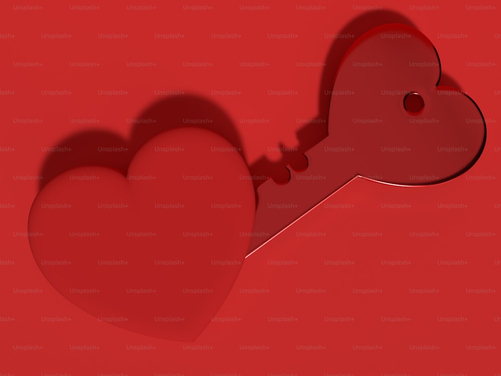 une clé rouge en forme de cœur sur fond rouge