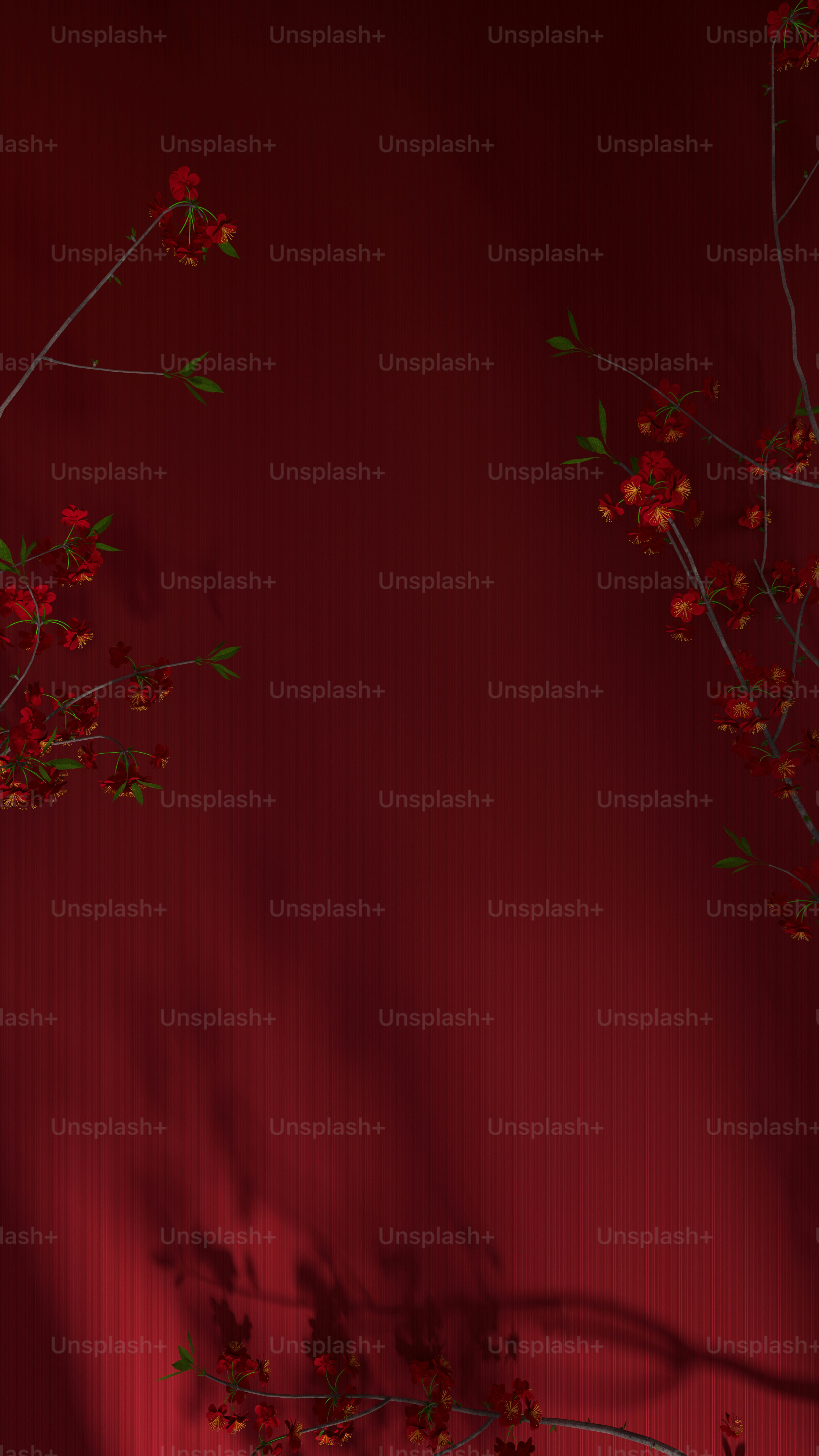 a red background with some red flowers on it