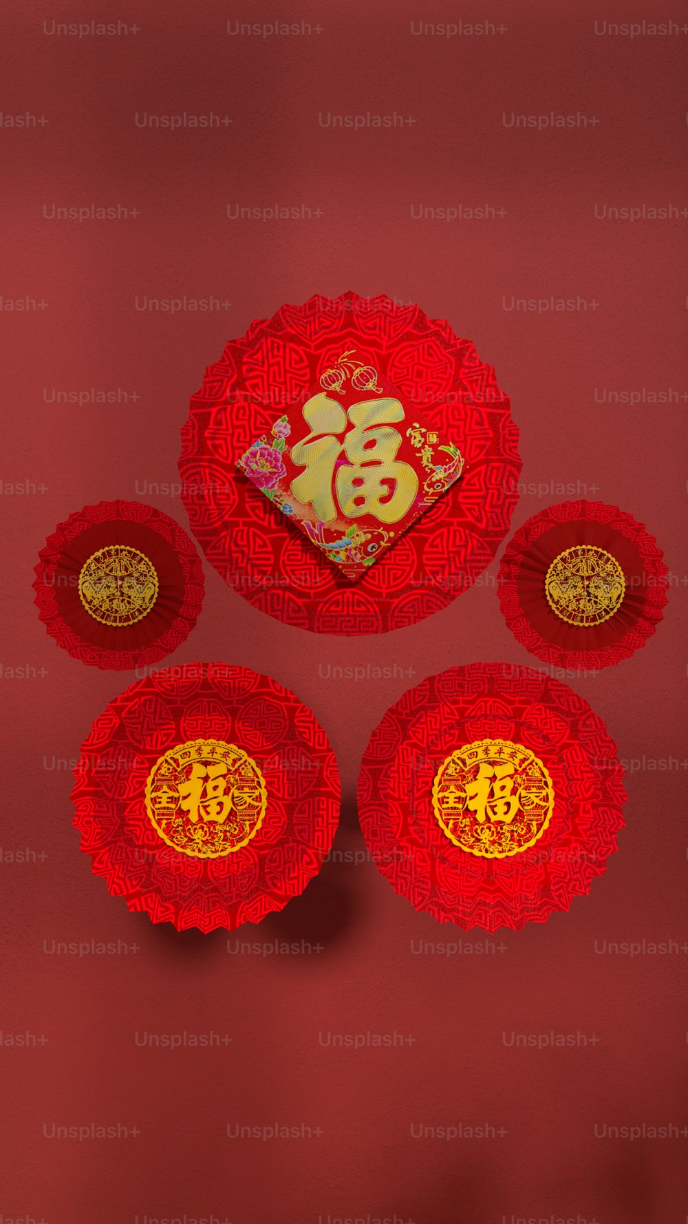 a group of red plates sitting on top of a table