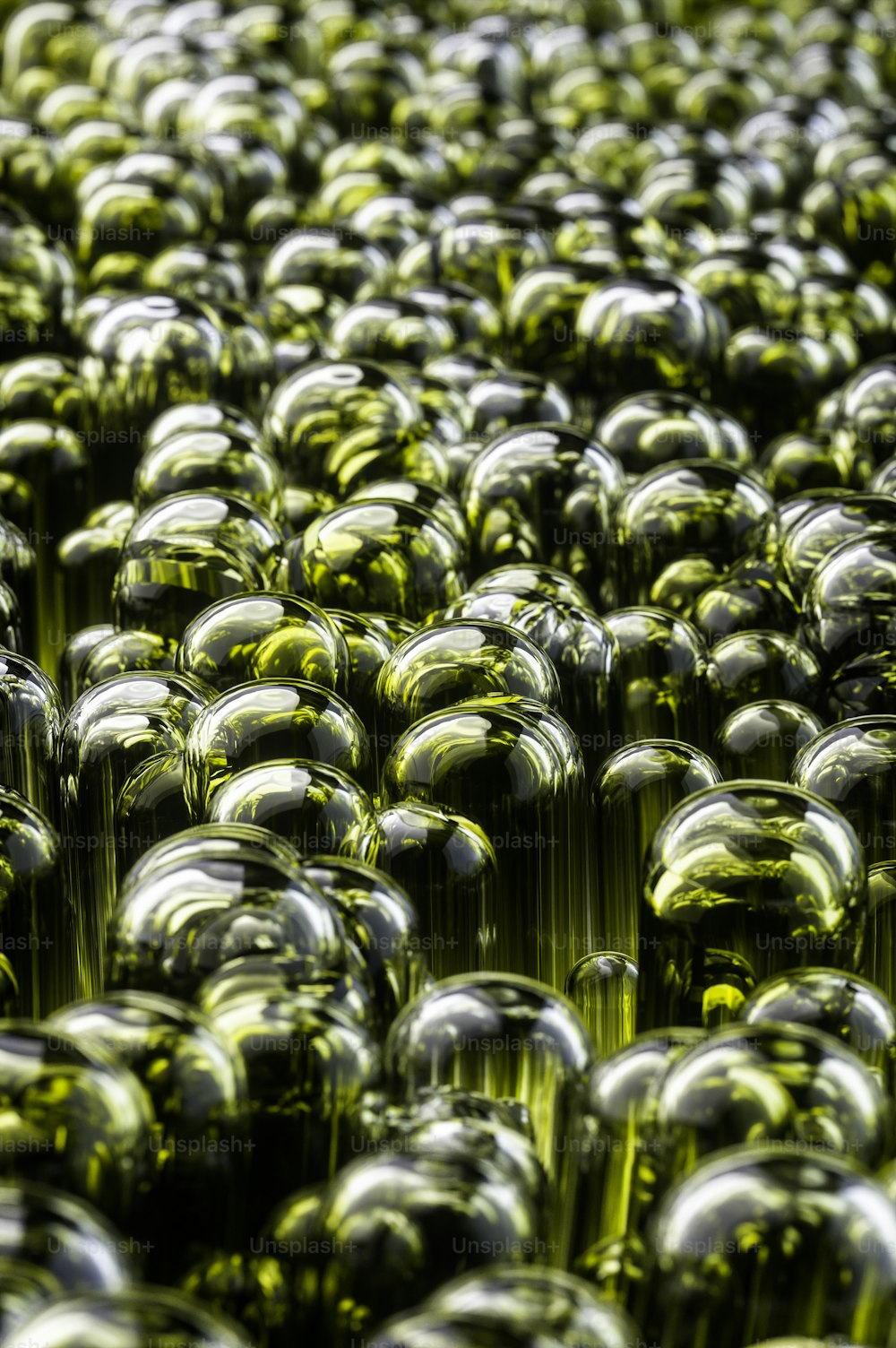 a large group of shiny glass balls