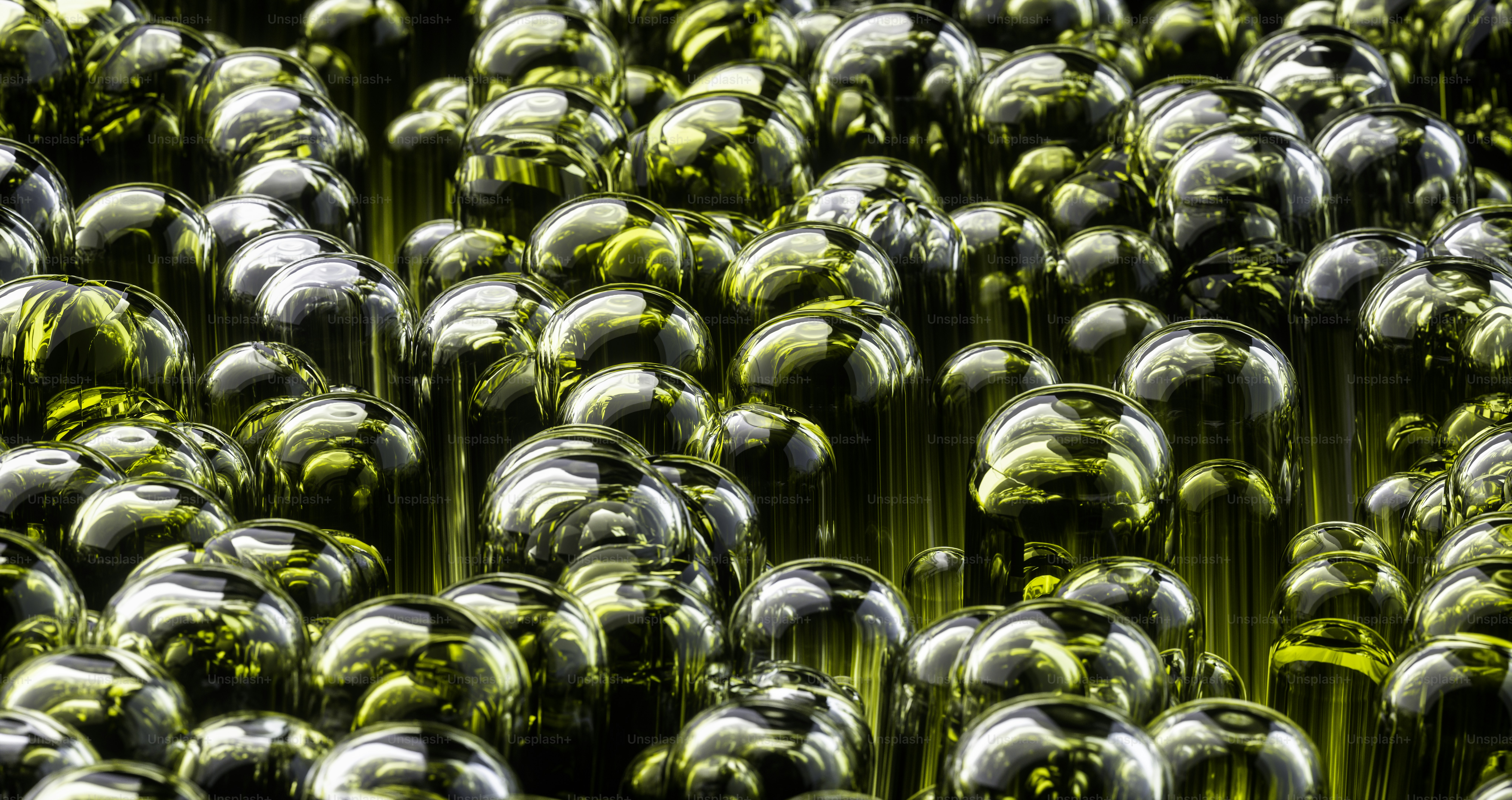 a large group of shiny glass balls