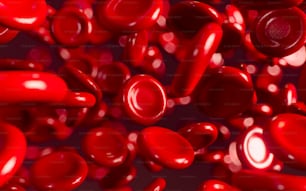 um monte de pílulas vermelhas que estão em uma mesa