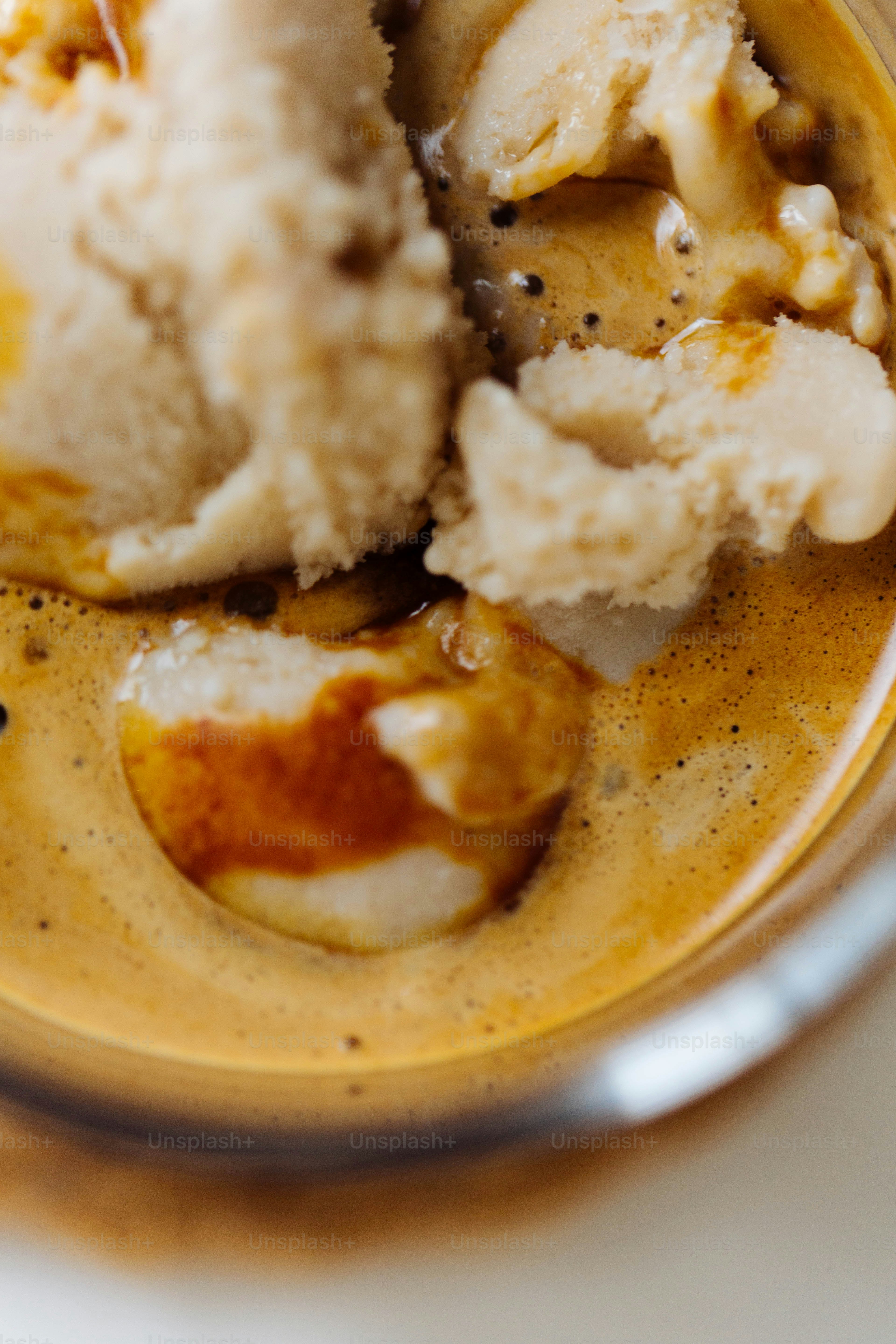 Two scoops of ice cream sit in a bowl photo Affogato Image on Unsplash