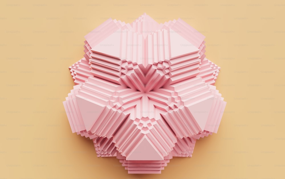 a pink sculpture made out of paper on a yellow background