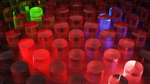 a group of different colored candles sitting next to each other
