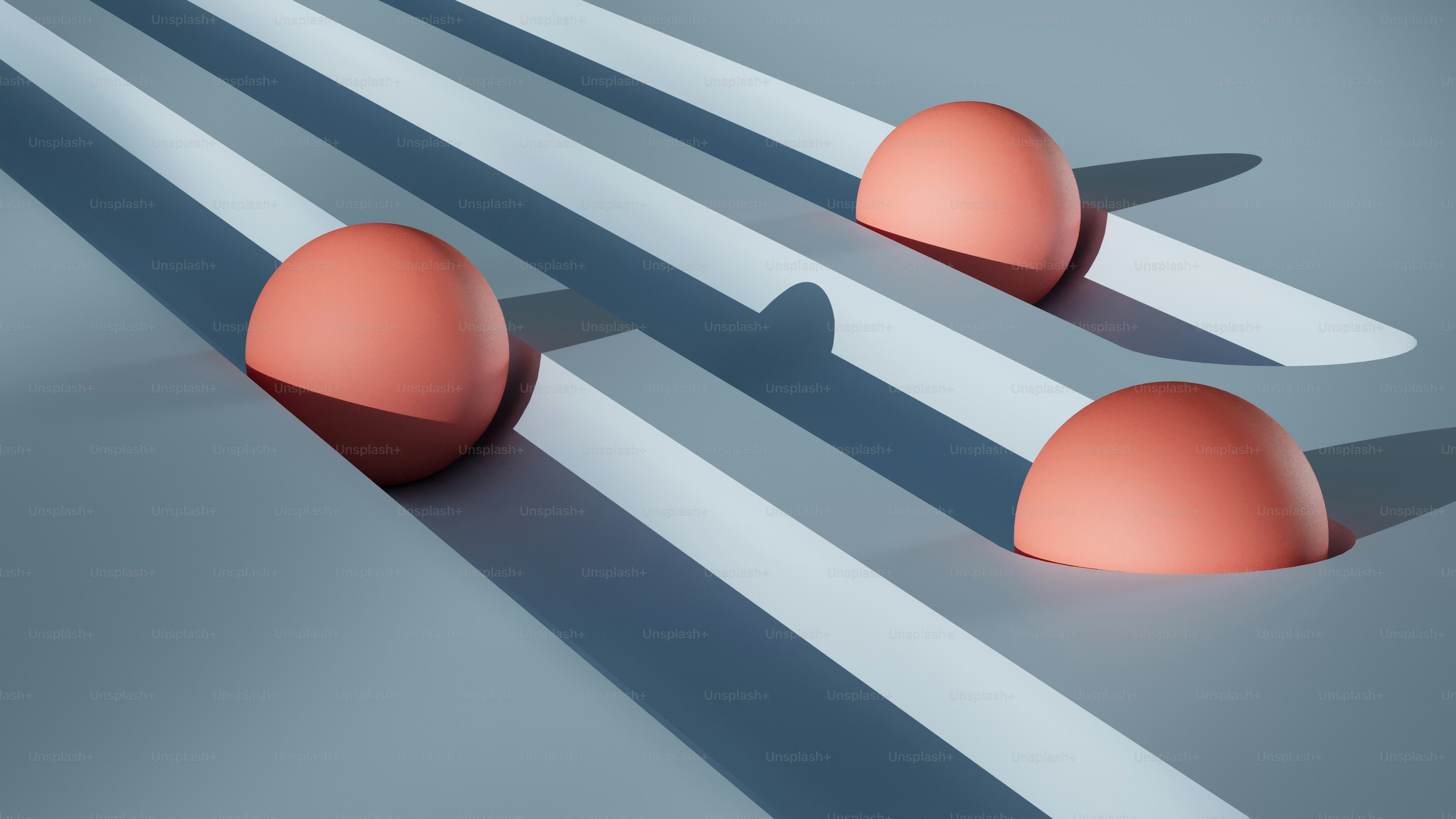 テーブルの上に座っている3つのオレンジ色の卵のグループ