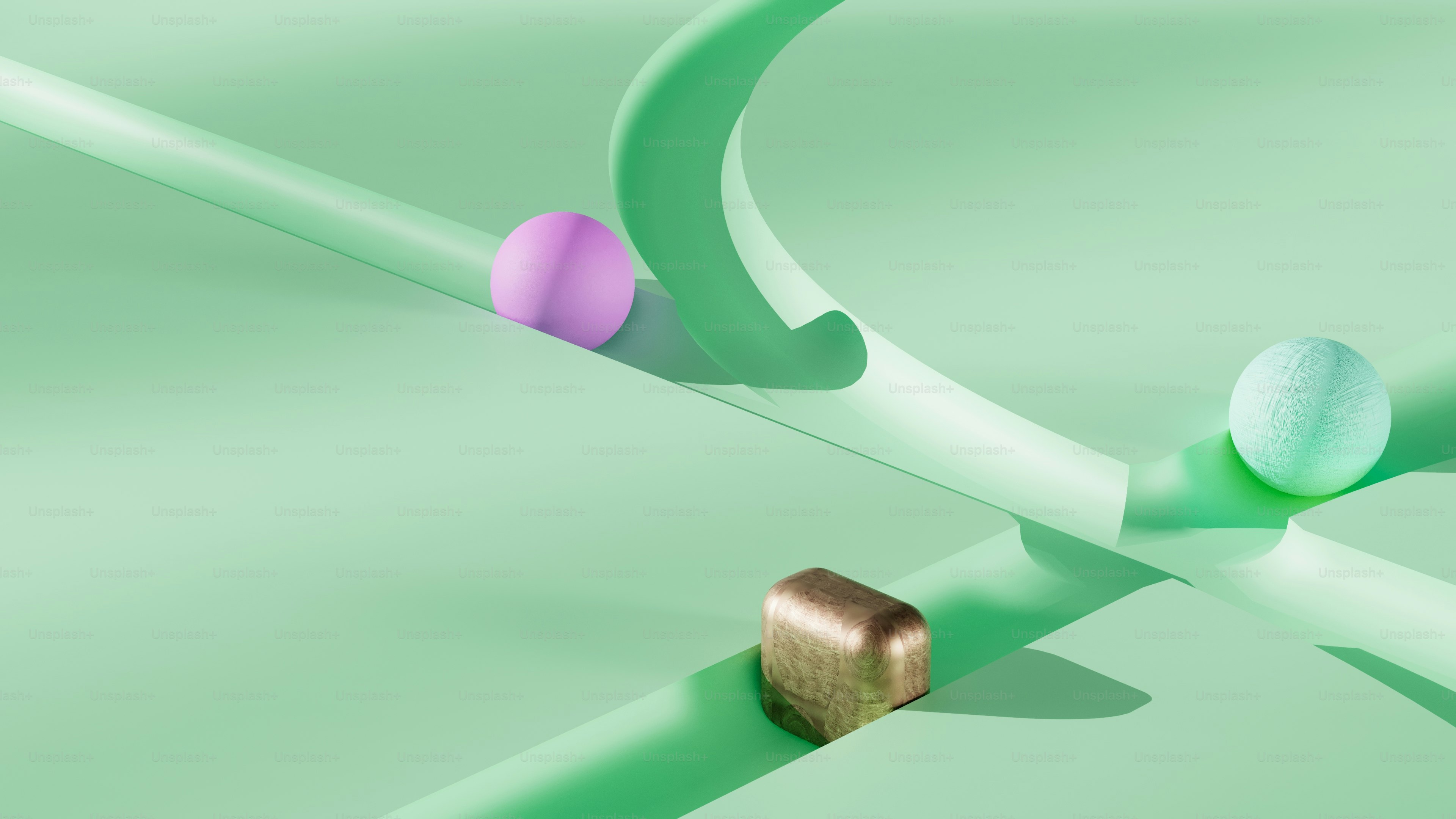 a close up of two balls on a green surface