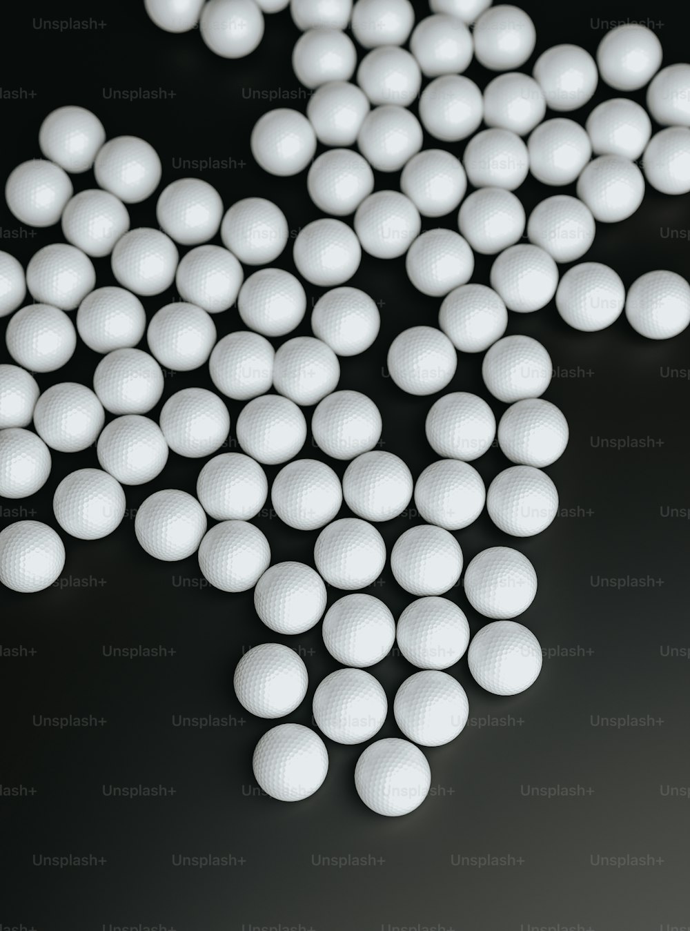 a bunch of white pills laying on top of a table