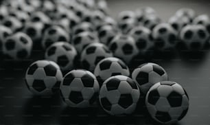 黒と白のサッカーボールのグループ