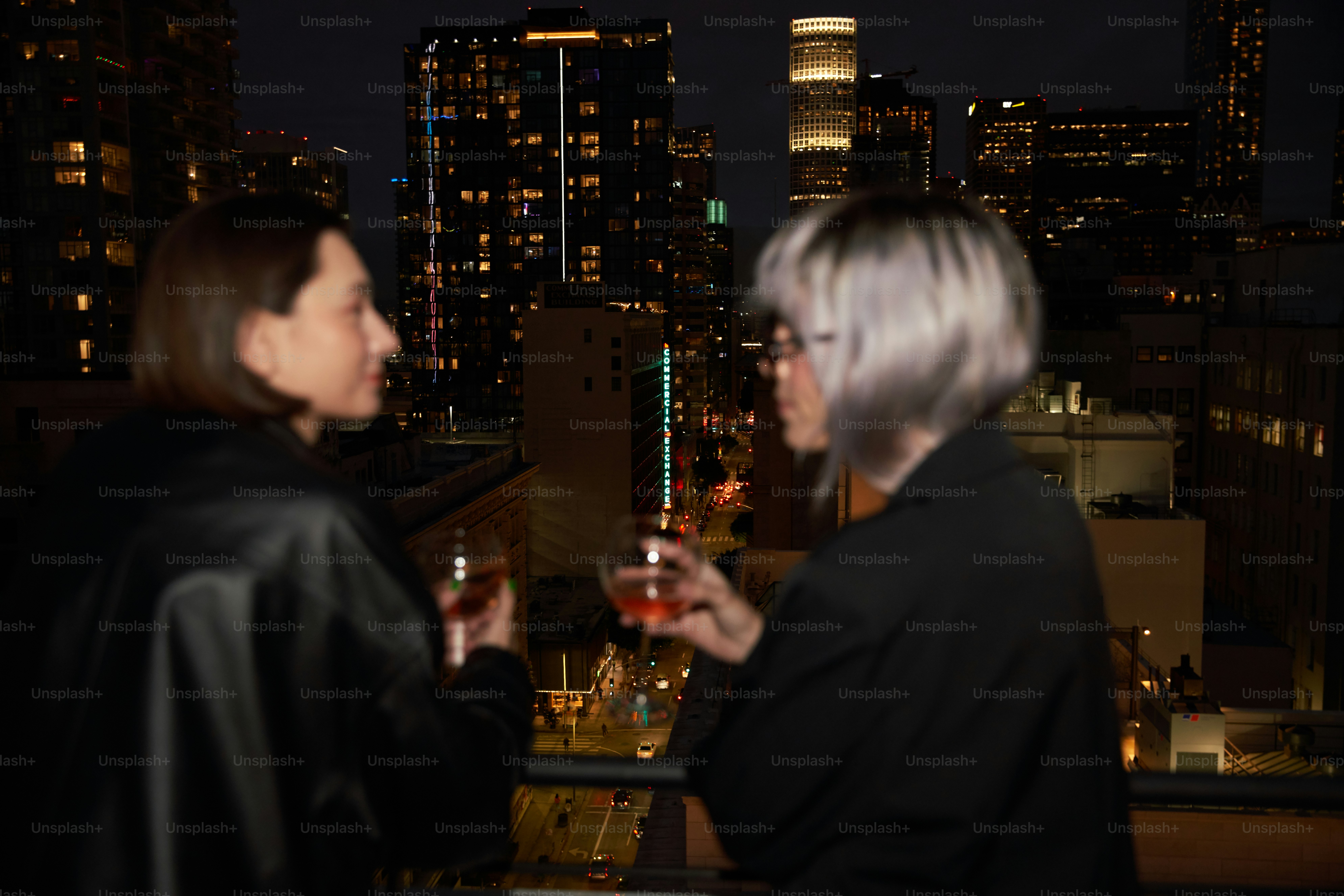 a couple of women standing next to each other