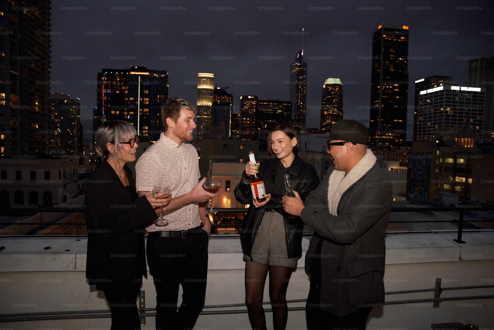 a group of people standing on top of a roof