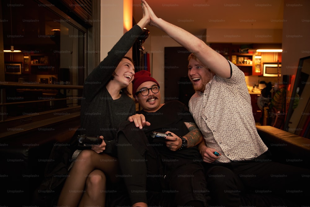 a group of people that are sitting on a couch