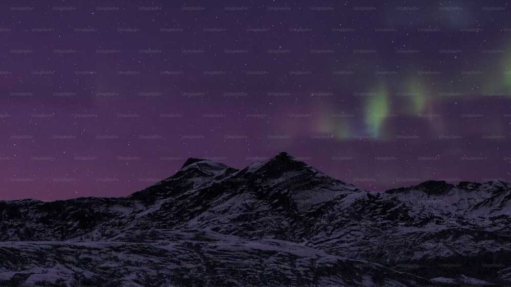 a purple sky with some green and purple lights
