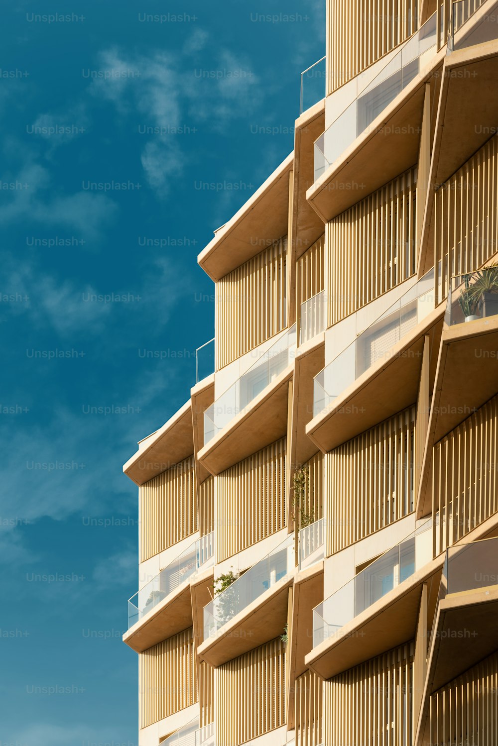 a tall building with balconies and balconies on the balconies