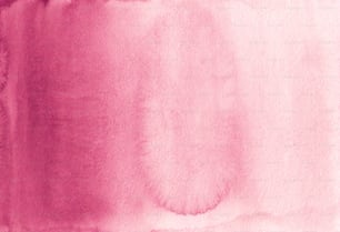 a close up of a pink watercolor background