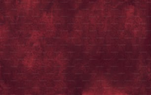 a close up of a red cloth texture
