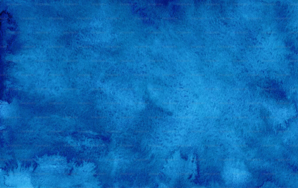 a blue watercolor background with a black border