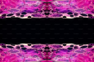 a black background with a pink and purple pattern