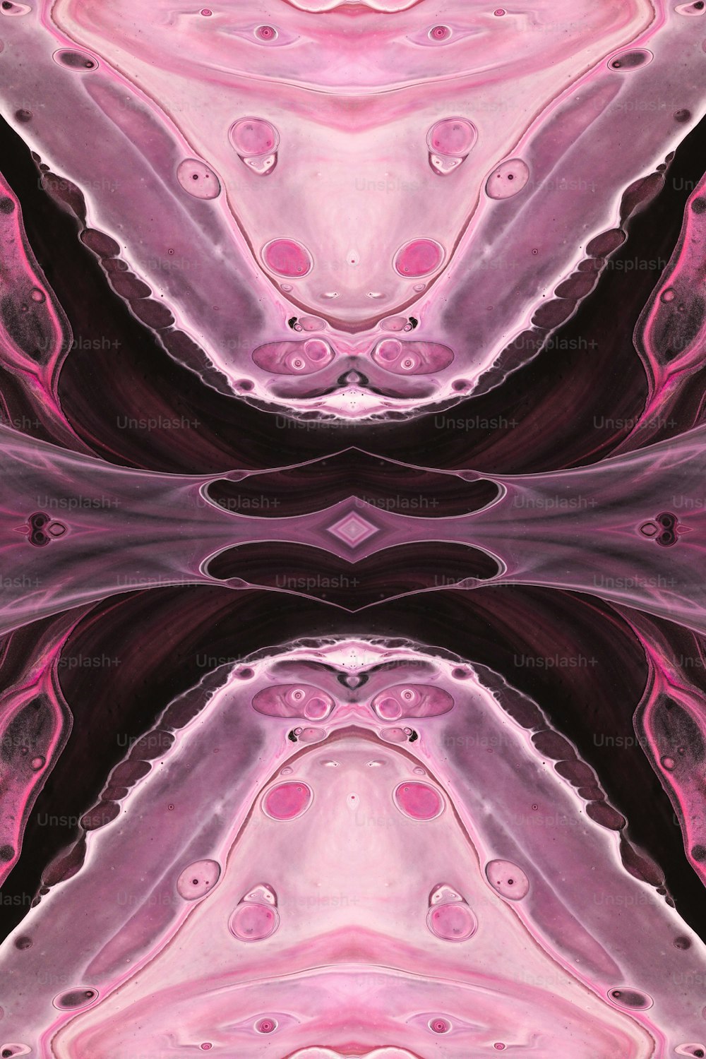 an abstract pink and black background with a pattern