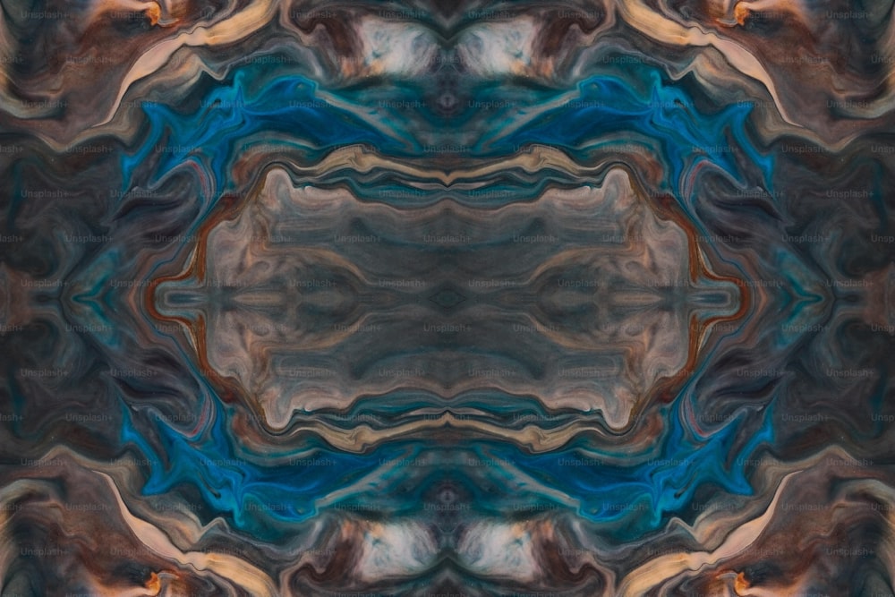 Ein abstraktes Bild eines blauen, braunen und schwarzen Musters